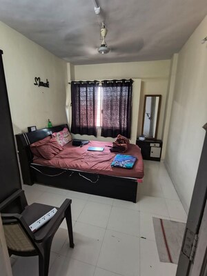 Bedroom in 2 BHK Apartment at Karan Ceto, Wadgaon Sheri – for Rent