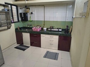 Kitchen in 2 BHK Apartment at Karan Ceto, Wadgaon Sheri – for Rent