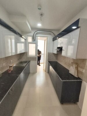 Kitchen in 4 BHK Apartment at Amrapali Heartbeat City, Sector 107 – for Sale