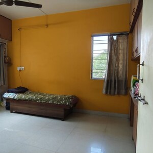 Living Room in 2 BHK Apartment at Pimpri Gaon – for Sale