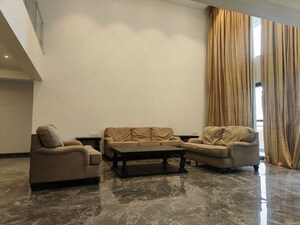 Living Room in 5 BHK Apartment at Clover Realty Delta Empress, Sopan Baug – for Rent