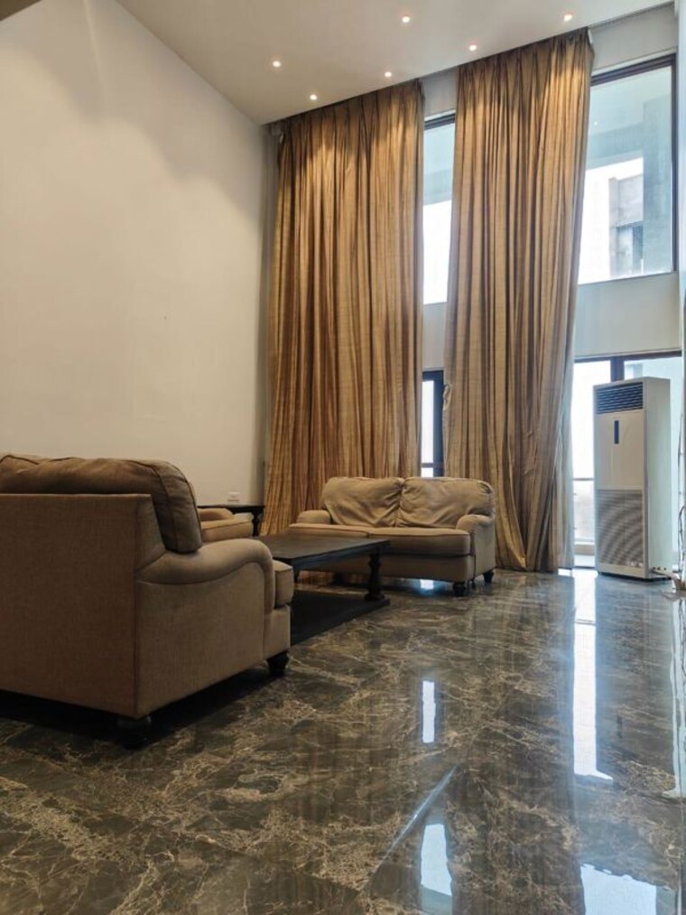 Living Room, clover-realty-delta-empress 5 Bedroom 8486 Sq.Ft. Apartment In Sopan Baug Pune 10313937