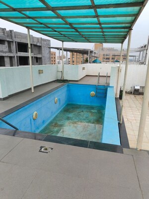 Swimming Pool in 5 BHK Apartment at Clover Realty Delta Empress, Sopan Baug – for Rent