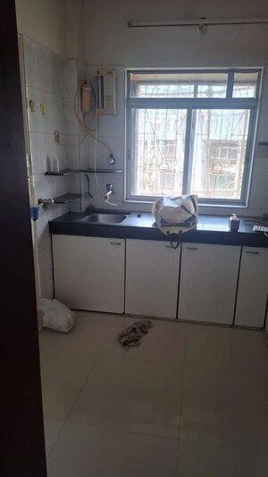 Team Area in 1 BHK Apartment at Harmony CHS Andheri West, Andheri West – for Rent