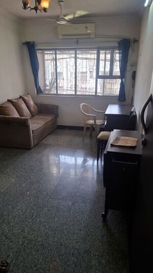 Living Room in 1 BHK Apartment at Harmony CHS Andheri West, Andheri West – for Rent