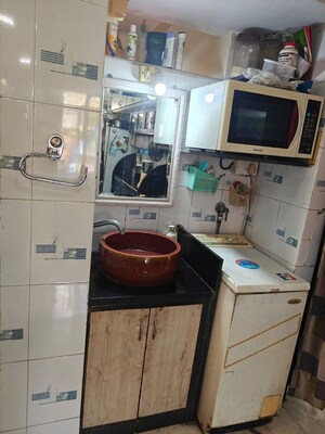 Kitchen in 2 BHK Apartment at Red Rose CHS 1, Andheri West – for Rent