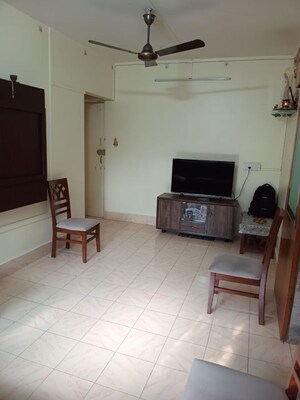 Living Room in 2 BHK Apartment at Versova Vinus Apartment, Andheri West – for Rent