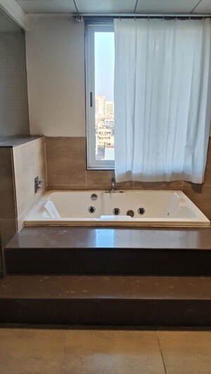 Bathroom in 4 BHK Apartment at Marvel Bounty, Hadapsar – for Rent