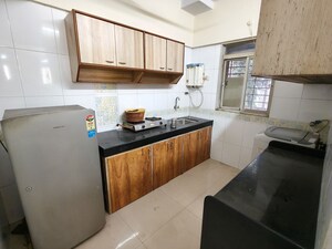 Kitchen in 2 BHK Apartment at Krishna Arcade Apartment, Kopar Khairane Sector 2 – for Rent
