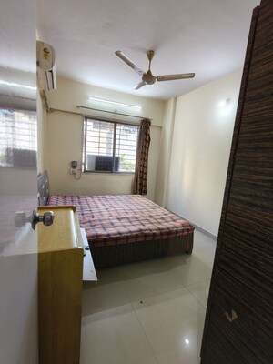 Bedroom in 2 BHK Apartment at Krishna Arcade Apartment, Kopar Khairane Sector 2 – for Rent