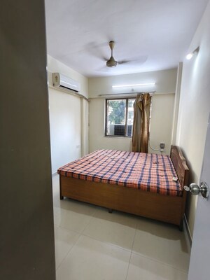 Bedroom in 2 BHK Apartment at Krishna Arcade Apartment, Kopar Khairane Sector 2 – for Rent