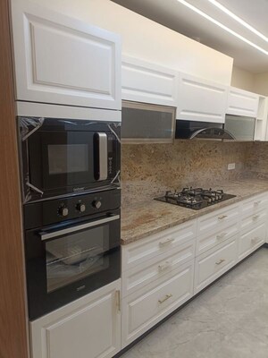 Kitchen in 3 BHK Builder Floor at Ansal API Esencia, Sector 67 – for Rent