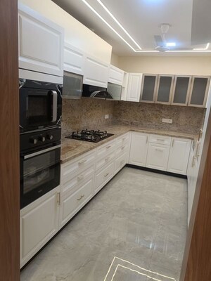 Kitchen in 3 BHK Builder Floor at Ansal API Esencia, Sector 67 – for Rent