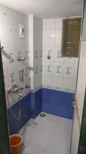 Bathroom in 1 BHK Apartment at Rutu Enclave, Kasarvadavali – for Rent