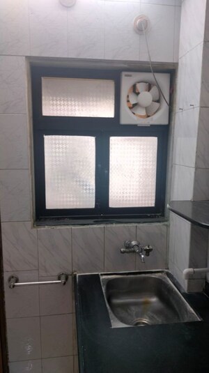 Kitchen in 1 BHK Apartment at Rutu Enclave, Kasarvadavali – for Rent