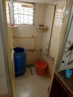 Bathroom in 1 BHK Apartment at Nagari Niwara CHS, Goregaon East – for Rent