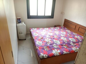 Bedroom in 1 BHK Apartment at Nagari Niwara CHS, Goregaon East – for Rent