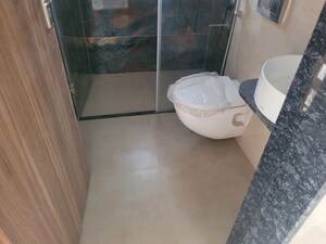 Bathroom in 2 BHK Apartment at Swojas Advait, Shivajinagar – for Rent