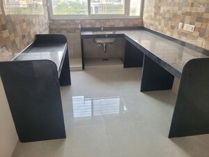 Kitchen in 2 BHK Apartment at Swojas Advait, Shivajinagar – for Rent