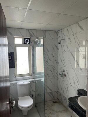 Bathroom in 2.5 BHK Apartment at Nimbus The Golden Palm, Sector 168 – for Rent