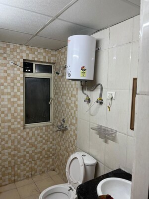 Bathroom in 2.5 BHK Apartment at Nimbus The Golden Palm, Sector 168 – for Rent