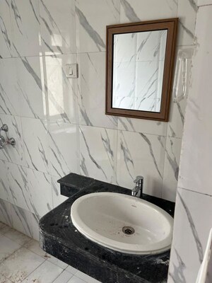 Bathroom in 2.5 BHK Apartment at Nimbus The Golden Palm, Sector 168 – for Rent