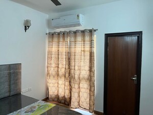 Bedroom in 2.5 BHK Apartment at Nimbus The Golden Palm, Sector 168 – for Rent