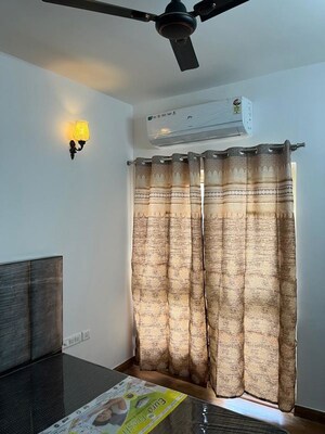 Room in 2.5 BHK Apartment at Nimbus The Golden Palm, Sector 168 – for Rent
