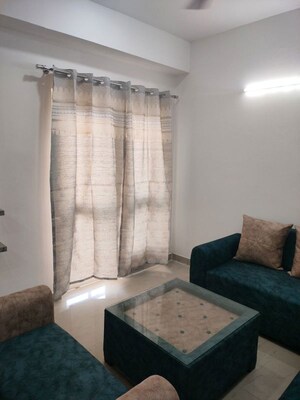 Living Room in 2.5 BHK Apartment at Nimbus The Golden Palm, Sector 168 – for Rent