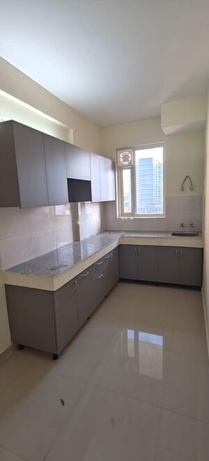 Kitchen in 2.5 BHK Apartment at Smart World Orchard, Sector 61 – for Rent
