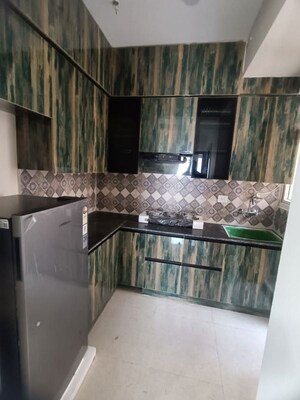 Kitchen in 2 BHK Apartment at Signature Global City 63A, Sector 63a – for Rent