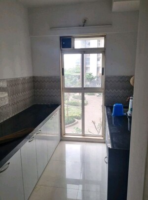 Kitchen in 2 BHK Apartment at Lodha Anjur Upper Thane, Anjur – for Rent