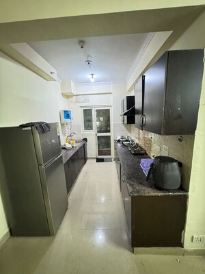 Kitchen in 2.5 BHK Apartment at Supertech Cape Town, Sector 74 – for Rent