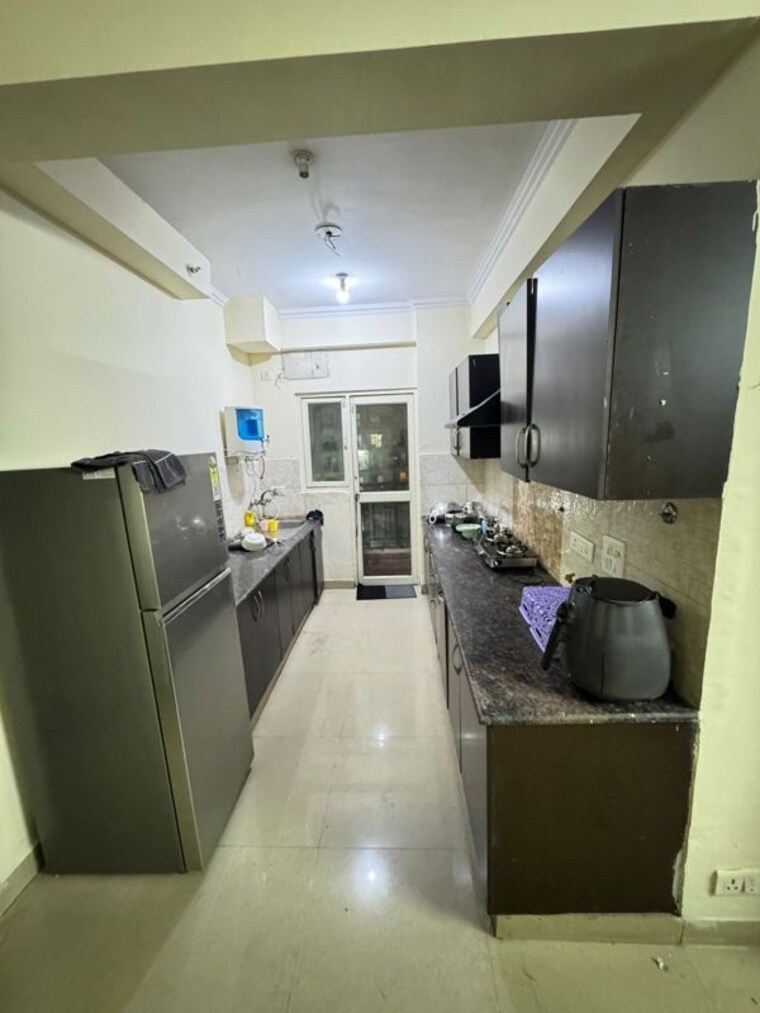 Kitchen, supertech-cape-town 2.5 Bedroom 1200 Sq.Ft. Apartment In Sector 74 Noida 10314819