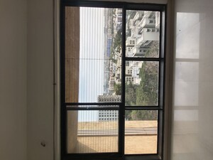 Room in 2 BHK Apartment at Kanakia Rainforest, Andheri East – for Rent