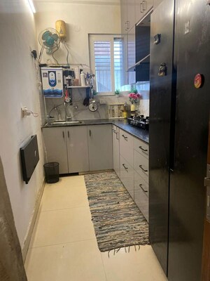 Kitchen in 3 BHK Apartment at Amrapali Golf Homes, Sector 4 Greater Noida – for Rent