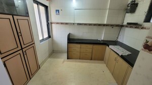 Kitchen in 1 BHK Apartment at Ashoka CHS, Vasant Vihar – for Rent