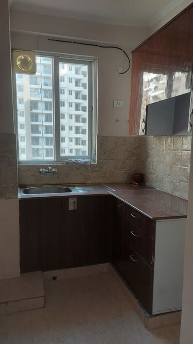 Kitchen, amrapali-golf-homes 2.5 Bedroom 945 Sq.Ft. Apartment In Sector 4 Greater Noida Greater Noida 10314993