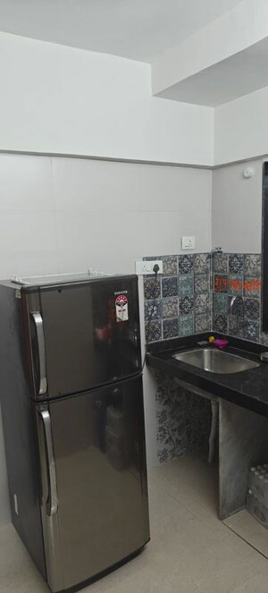 Kitchen in 1 BHK Apartment at Vaibhav Wisteria Residency, Santacruz East – for Rent