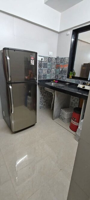 Kitchen in 1 BHK Apartment at Vaibhav Wisteria Residency, Santacruz East – for Rent