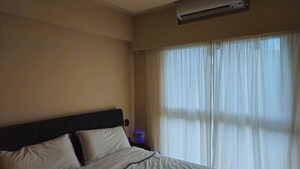 Bedroom in 2 BHK Apartment at Shapoorji Pallonji Astron, Kandivali East – for Rent