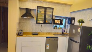 Kitchen in 2 BHK Apartment at Shapoorji Pallonji Astron, Kandivali East – for Rent