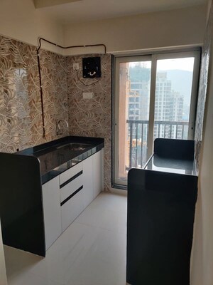 Kitchen in 1 BHK Apartment at Raunak Residency Thane, Pokhran Road No One – for Sale