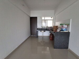 Kitchen in 3 BHK Apartment at Mantra Parkview, Dhayari – for Sale