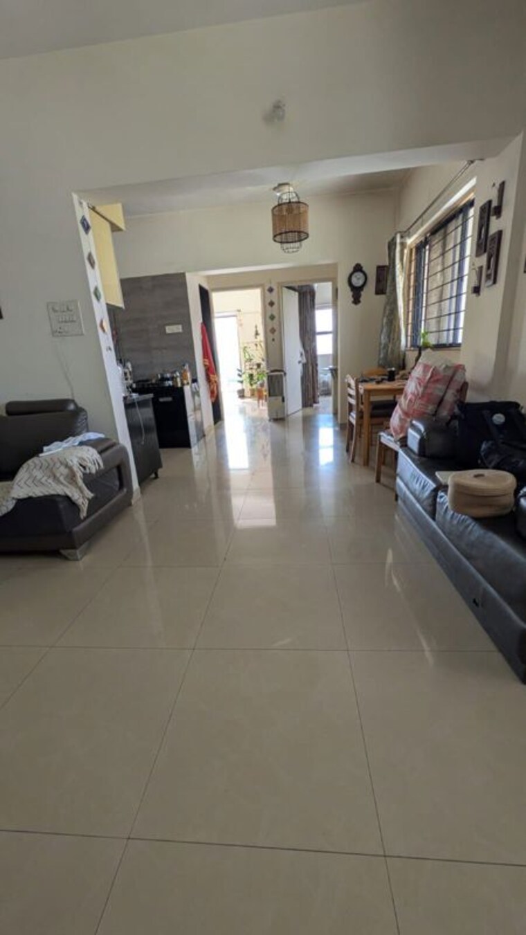 Living Room, magarpatta-city-cosmos 2 Bedroom 1650 Sq.Ft. Apartment In Magarpatta Road Pune 10315135