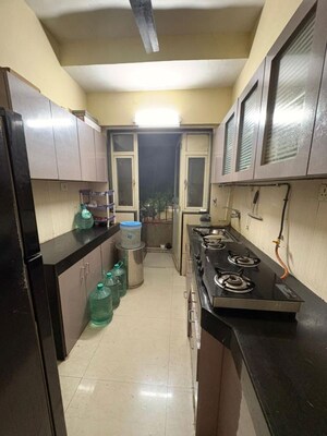 Kitchen in 2 BHK Apartment at Evershine Pine CHS, Mira Road – for Rent