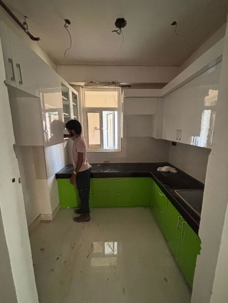 Kitchen, supertech-eco-village-ii 3 Bedroom 1267 Sq.Ft. Apartment In Sector 16b Greater Noida Greater Noida 10315311