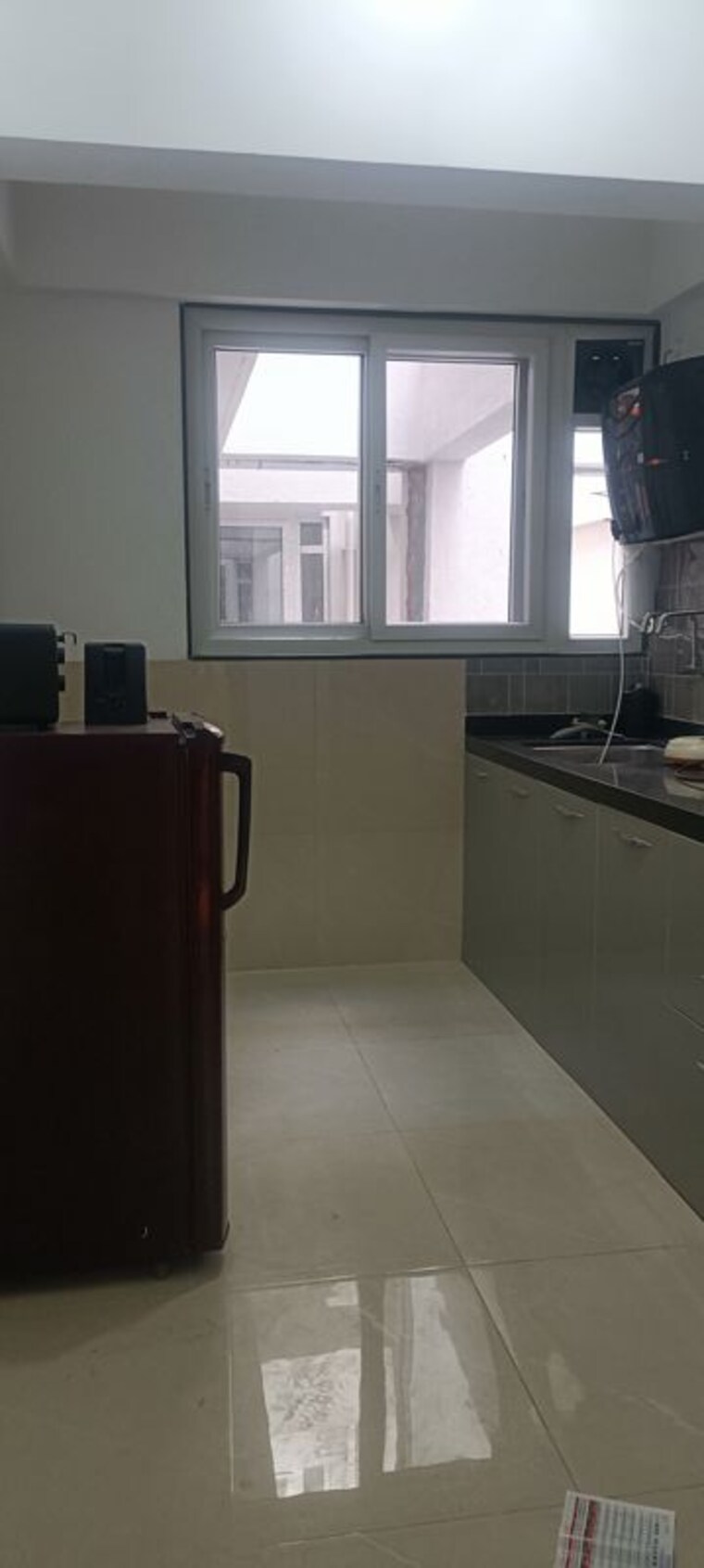 Kitchen, pristine-allure 1.5 Bedroom 550 Sq.Ft. Apartment In Kharadi Pune 10315327