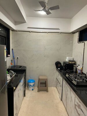 Kitchen in 3 BHK Apartment at Amal Juhu Sheetal CHS, Juhu – for Rent