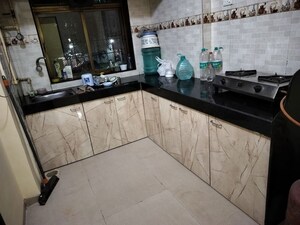 Kitchen in 1 BHK Apartment at Malad Swami Prasad Apartment, Malad West – for Rent